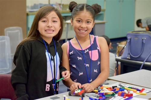 Two students working on a project.